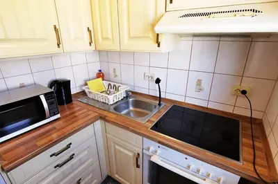 Küche/Küchenzeile in der Unterkunft FR13 - Modernes 1-Zimmer-Apartment mit Balkon in Rodgau