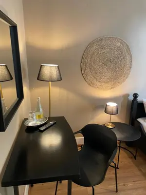 Ein Sitzbereich in der Unterkunft AUERSTEIN-Hotels auerstein & auerstein-mono