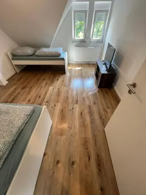 Ein Bett oder Betten in einem Zimmer der Unterkunft Monteurwohnung Pforzheim - L8 Street