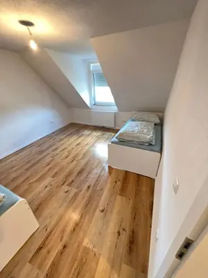 Ein Bett oder Betten in einem Zimmer der Unterkunft Monteurwohnung Pforzheim - L8 Street