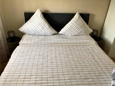 Ein Bett oder Betten in einem Zimmer der Unterkunft Herz der Weinberge