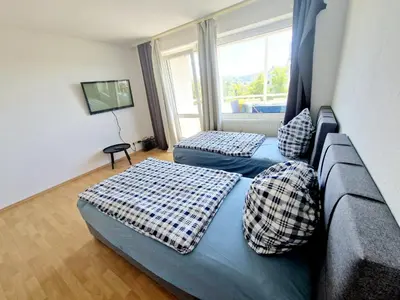 Ein Bett oder Betten in einem Zimmer der Unterkunft Relax Wohnung in Bensheim Auerbach