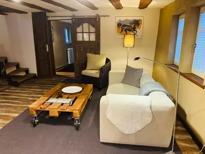 Ein Sitzbereich in der Unterkunft Studiowohnung im preisgekrönten Denkmal in Groß-Umstadt