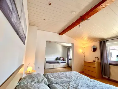 Ein Bett oder Betten in einem Zimmer der Unterkunft Gemütliche FeWo 