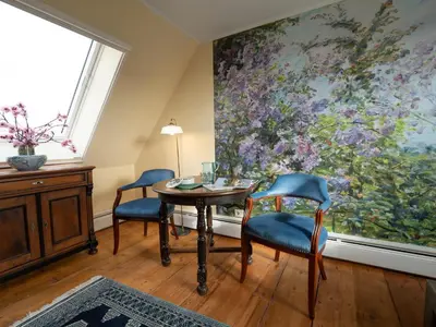 Ein Sitzbereich in der Unterkunft REFUGIUM Theresienstraße 19 - Chambre Slevogt