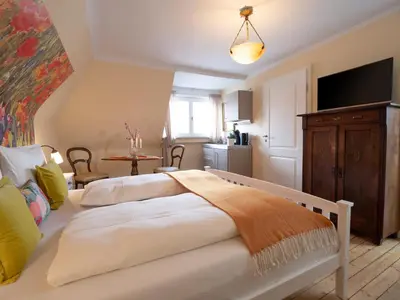 Ein Bett oder Betten in einem Zimmer der Unterkunft REFUGIUM Theresienstraße 19 - Chambre Vonnoh