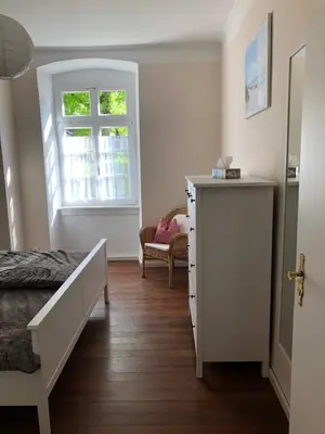 Ein Bett oder Betten in einem Zimmer der Unterkunft Altes Schulhaus Mutschelbach