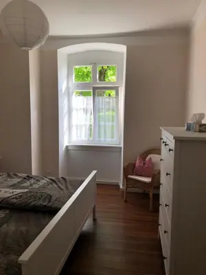 Ein Bett oder Betten in einem Zimmer der Unterkunft Altes Schulhaus Mutschelbach