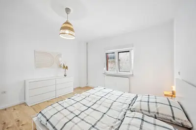 Ein Bett oder Betten in einem Zimmer der Unterkunft Casa Bergstraße 1