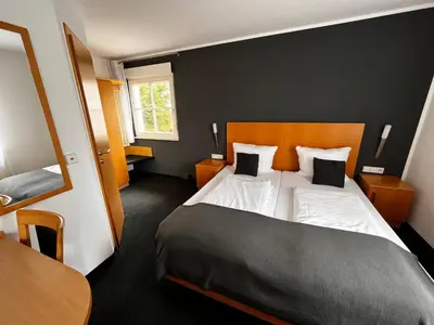 Ein Bett oder Betten in einem Zimmer der Unterkunft Landhaus Hohly