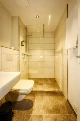 Ein Badezimmer in der Unterkunft Beim Mühlenwirt