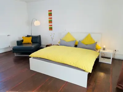 Ein Bett oder Betten in einem Zimmer der Unterkunft Auszeit - Historisches Ferienhaus in der Südpfalz