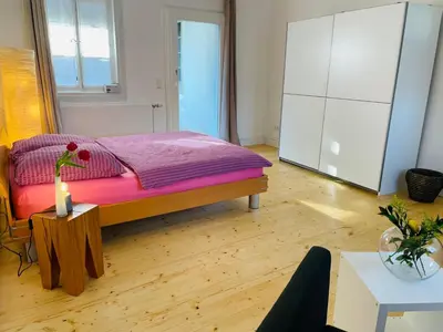 Ein Bett oder Betten in einem Zimmer der Unterkunft Auszeit - Historisches Ferienhaus in der Südpfalz