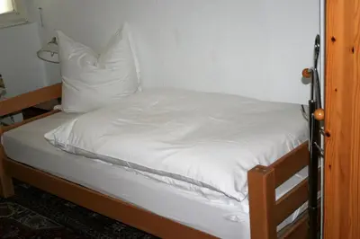 Ein Bett oder Betten in einem Zimmer der Unterkunft Herrenhof
