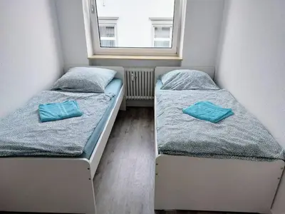 Ein Bett oder Betten in einem Zimmer der Unterkunft L8 Street-Kaiserslautern-Monteurwohnung-Worker's apartment