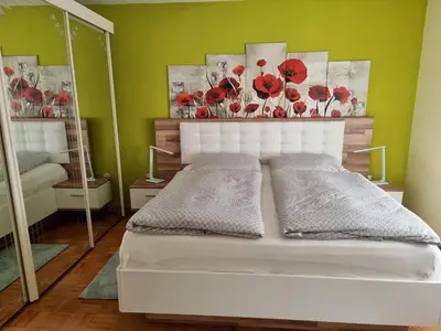 Ein Bett oder Betten in einem Zimmer der Unterkunft Ferienwohnung Mohnblume