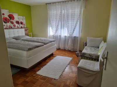 Ein Bett oder Betten in einem Zimmer der Unterkunft Ferienwohnung Mohnblume