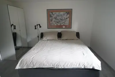Ein Bett oder Betten in einem Zimmer der Unterkunft Neue und zentral gelegene Wohnung in Stuttgart