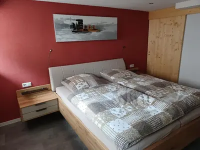 Ein Bett oder Betten in einem Zimmer der Unterkunft Ferienwohnung in der Grünheck