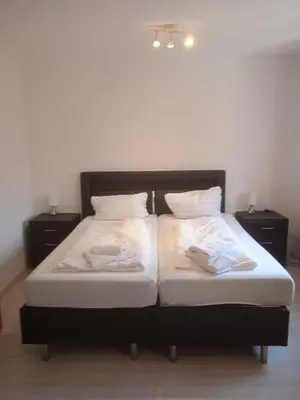 Ein Bett oder Betten in einem Zimmer der Unterkunft 3 Zimmer Wohnung