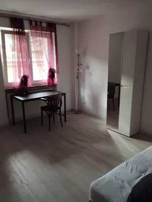 Ein Bett oder Betten in einem Zimmer der Unterkunft 3 Zimmer Wohnung
