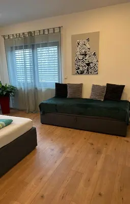 Ein Sitzbereich in der Unterkunft Apartment Im Sand nahe am See