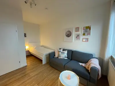 Ein Sitzbereich in der Unterkunft Ferienwohnungen Pfaffenhof