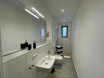 Ein Badezimmer in der Unterkunft Ferienwohnungen Pfaffenhof