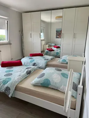 Ein Bett oder Betten in einem Zimmer der Unterkunft Apartment in Mainz-Lerchenberg