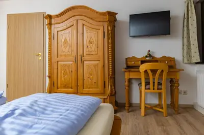 Ein Bett oder Betten in einem Zimmer der Unterkunft Gasthaus Rössle
