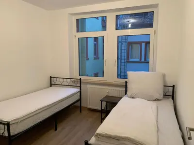 Ein Bett oder Betten in einem Zimmer der Unterkunft Monteurwohnung Heilbronn nahe Neckarsulm