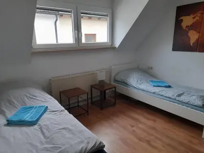 Ein Bett oder Betten in einem Zimmer der Unterkunft Monteurwohnung Heilbronn nahe Neckarsulm