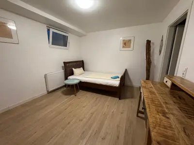 Ein Bett oder Betten in einem Zimmer der Unterkunft Business Apartment