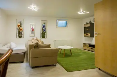 Ein Sitzbereich in der Unterkunft Business Apartment