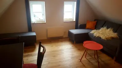 Ein Sitzbereich in der Unterkunft Brunnenputzer Pension Restaurant