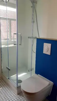 Ein Badezimmer in der Unterkunft Brunnenputzer Pension Restaurant