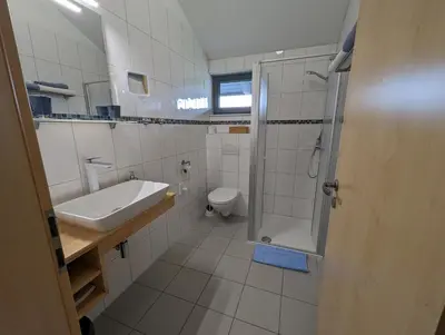 Ein Badezimmer in der Unterkunft Pension Victoria