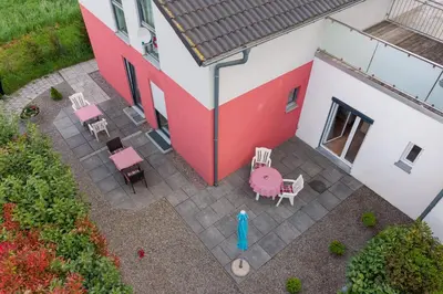 Ein Garten an der Unterkunft Pension Victoria