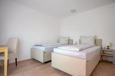 Ein Bett oder Betten in einem Zimmer der Unterkunft Pension Victoria