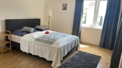 Ein Bett oder Betten in einem Zimmer der Unterkunft Art Apart Stuttgart