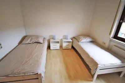 Ein Bett oder Betten in einem Zimmer der Unterkunft Schöne, große Wohnung mit Parkplatz und Wlan