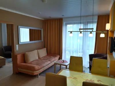 Ein Sitzbereich in der Unterkunft Kurpark-Residenz Deidesheim