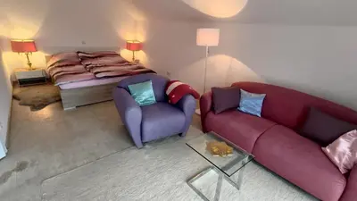 Ein Sitzbereich in der Unterkunft Ferienwohnung Dreiseetal
