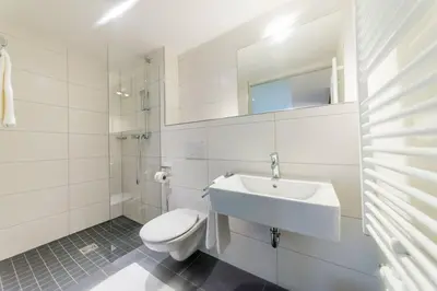 Ein Badezimmer in der Unterkunft Gästehaus am Marktbrunnen