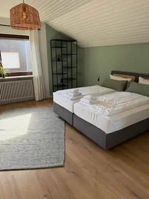 Ein Bett oder Betten in einem Zimmer der Unterkunft Sali Homes - SchaefersNest