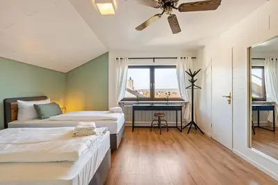 Ein Bett oder Betten in einem Zimmer der Unterkunft Sali Homes - SchaefersNest