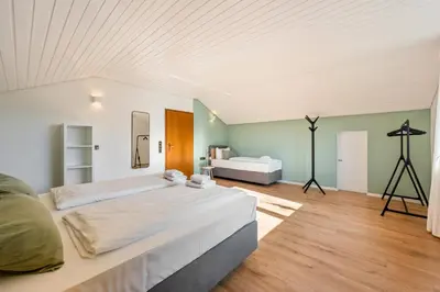 Ein Bett oder Betten in einem Zimmer der Unterkunft Sali Homes - SchaefersNest