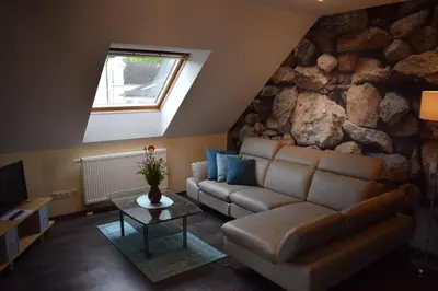 Ein Sitzbereich in der Unterkunft Ferienhaus & Weingut am Steingebiss