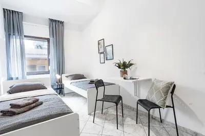 Ein Bett oder Betten in einem Zimmer der Unterkunft Chic 4 Room Apartment in Mannheim