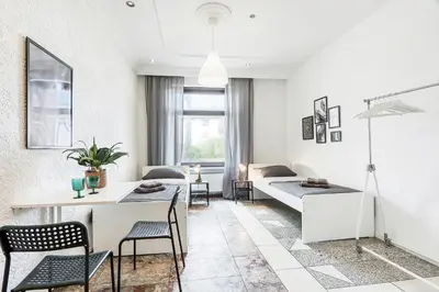 Ein Bett oder Betten in einem Zimmer der Unterkunft Chic 4 Room Apartment in Mannheim